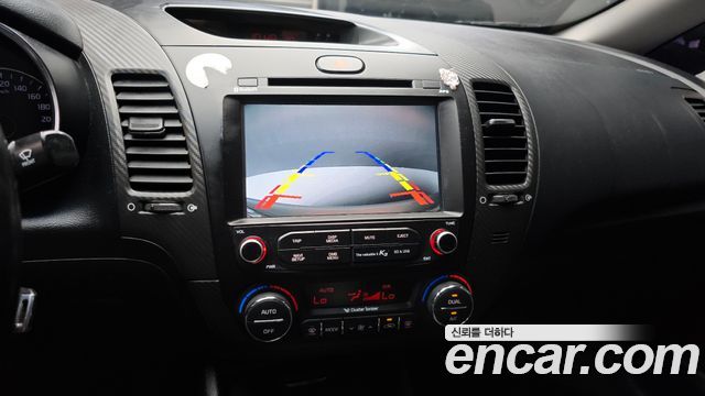 Kia K3 2013 — photo 16