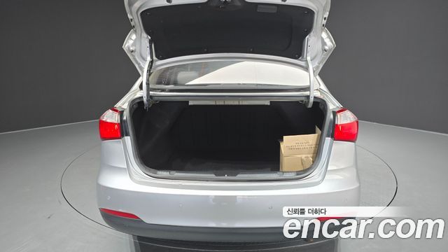Kia K3 2013 — photo 20
