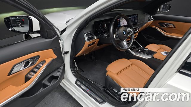 BMW 3-Series 2023 — photo 13