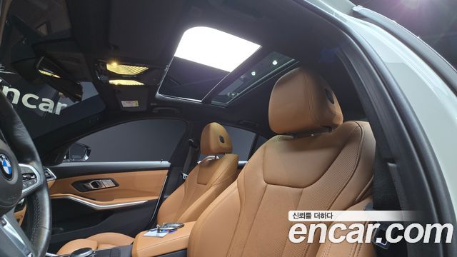 BMW 3-Series 2023 — photo 25