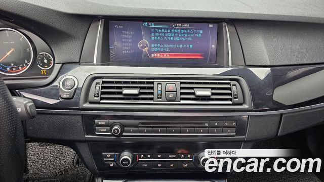 BMW 5-Series 2016 — photo 20