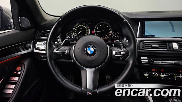 BMW 5-Series 2012 — photo 14