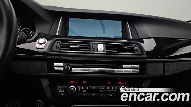 BMW 5-Series 2012 — photo 16