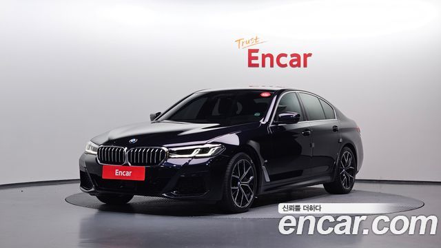 BMW 5-Series 2022 — photo 1