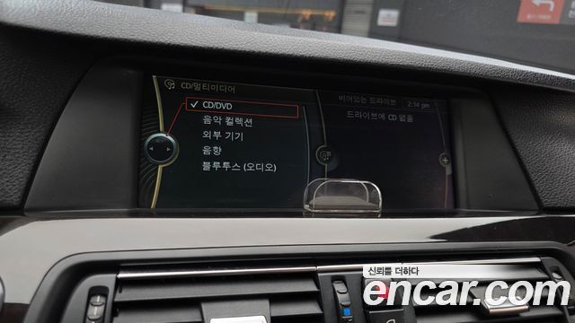BMW 5-Series 2013 — photo 21