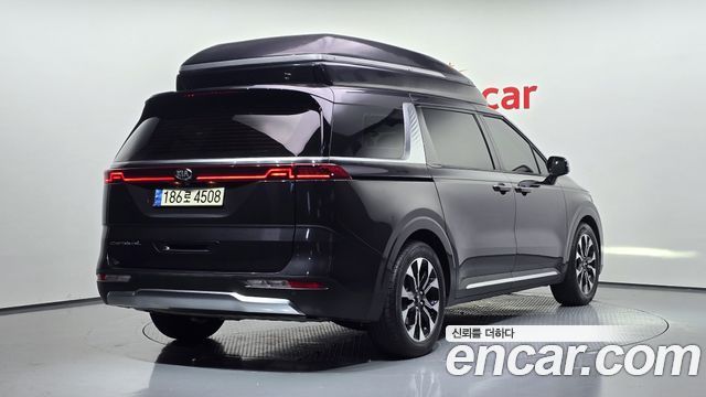 Kia Canival 2021 — photo 2