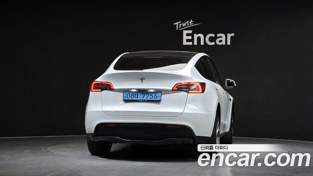 Tesla Model Y 2024 — photo 4