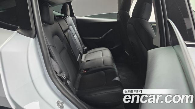 Tesla Model Y 2024 — photo 11