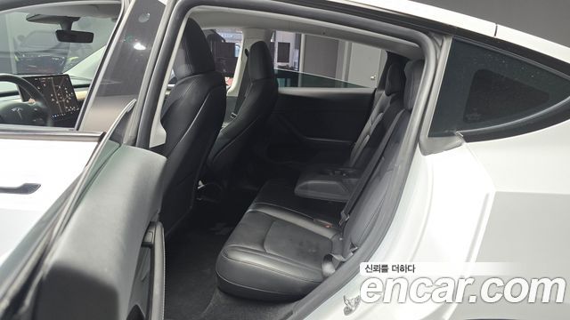 Tesla Model Y 2024 — photo 12