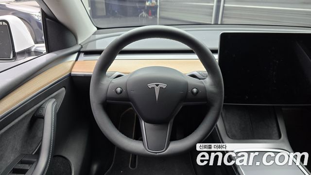 Tesla Model Y 2024 — photo 13