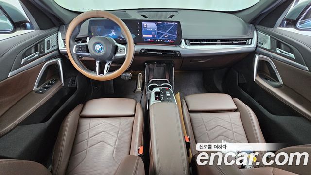BMW iX1 2024 — photo 10