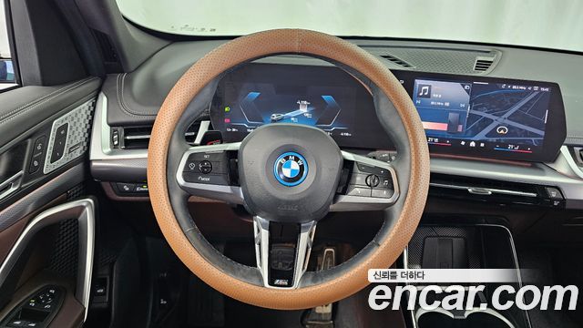 BMW iX1 2024 — photo 19