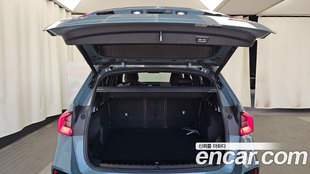 BMW iX1 2024 — photo 25
