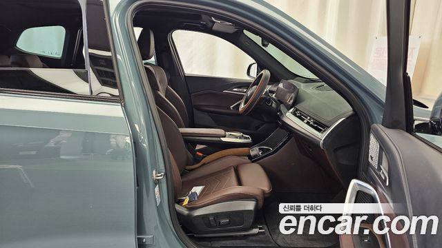 BMW iX1 2024 — photo 16