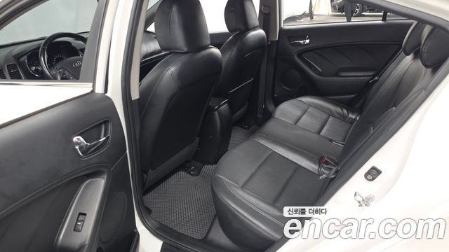 Kia K3 2013 — photo 12