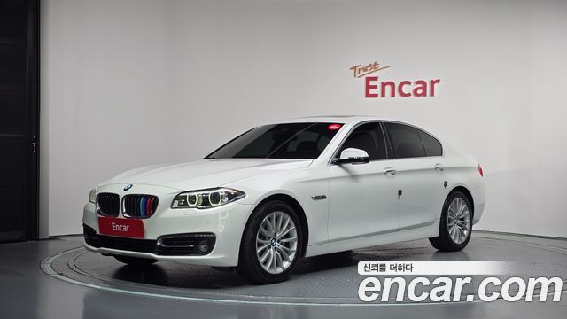 BMW 5-Series 2014 — photo 1