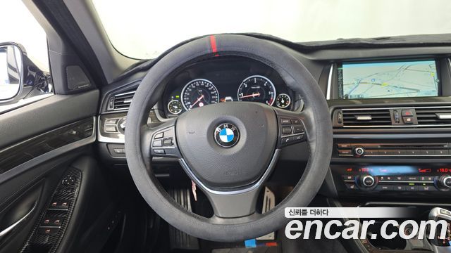 BMW 5-Series 2014 — photo 13