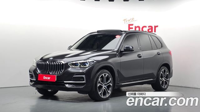 BMW X5 2022 — photo 1