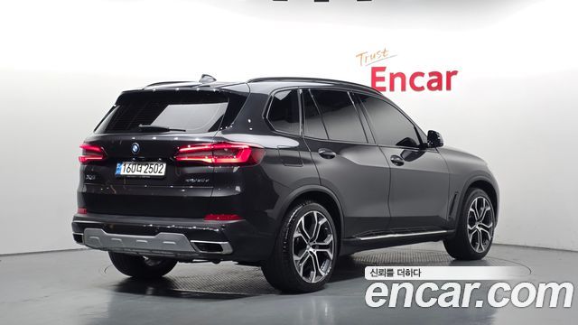 BMW X5 2022 — photo 2