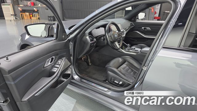 BMW 3-Series 2022 — photo 10