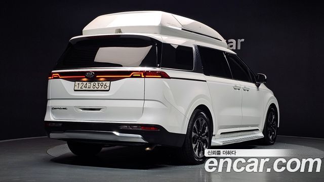 Kia Canival 2021 — photo 2