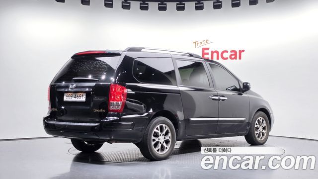 Kia Canival 2014 — photo 2