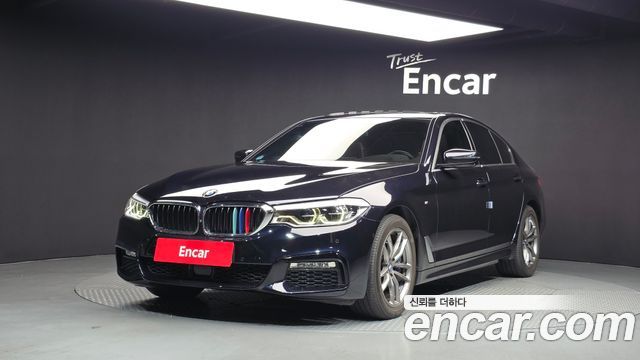 BMW 5-Series 2018 — photo 1