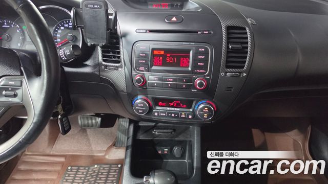 Kia K3 2015 — photo 14