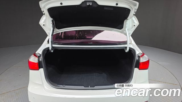 Kia K3 2015 — photo 20