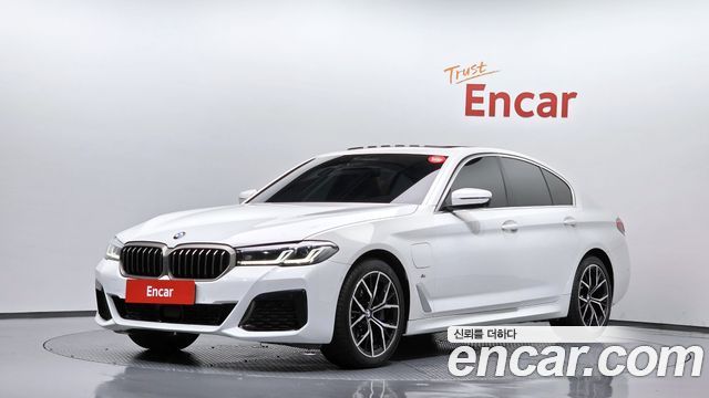 BMW 5-Series 2021 — photo 1