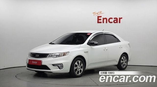 Kia Porte 2013 — photo 1