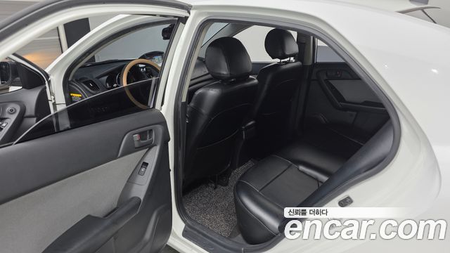 Kia Porte 2013 — photo 11