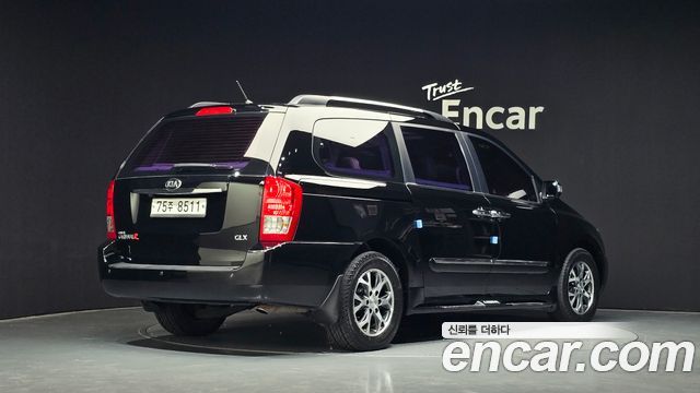 Kia Canival 2013 — photo 2