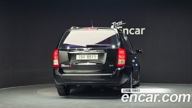 Kia Canival 2013 — photo 4