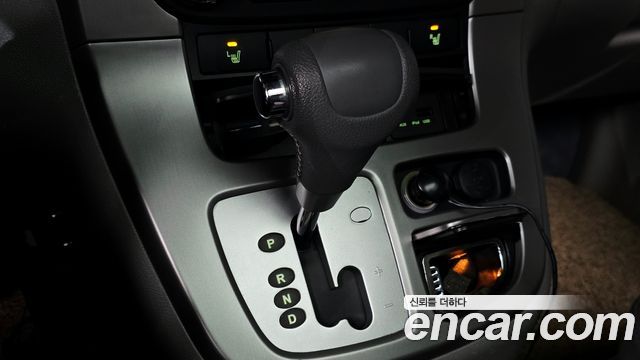 Kia Canival 2013 — photo 12