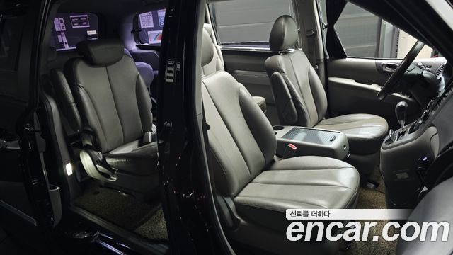 Kia Canival 2013 — photo 17