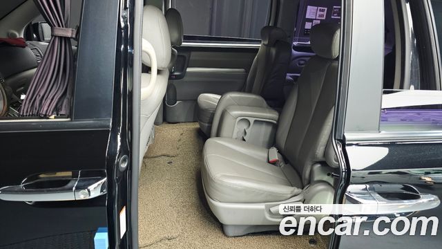 Kia Canival 2013 — photo 19