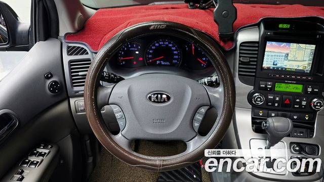 Kia Canival 2013 — photo 22
