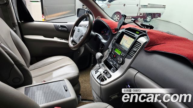 Kia Canival 2013 — photo 25