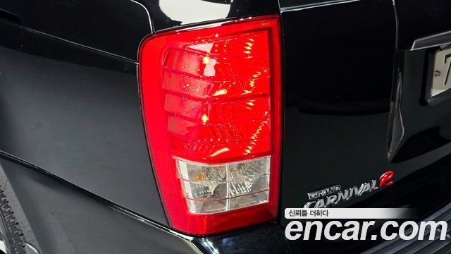 Kia Canival 2013 — photo 9