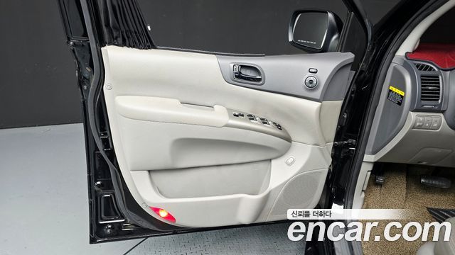 Kia Canival 2013 — photo 14
