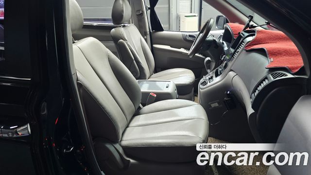 Kia Canival 2013 — photo 16