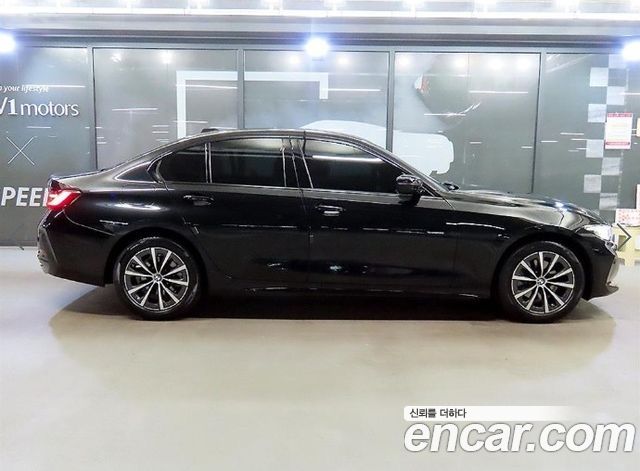 BMW 3-Series 2024 — photo 3