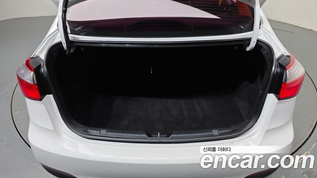 Kia K3 2015 — photo 20