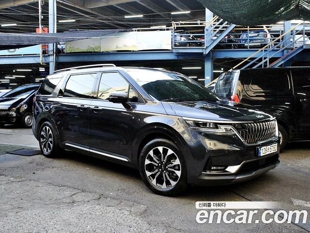 Kia Canival 2023 — photo 2