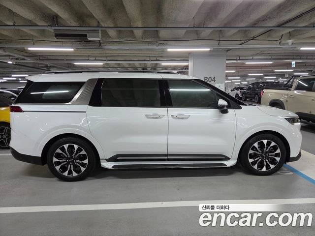 Kia Canival 2023 — photo 2