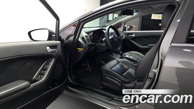 Kia K3 2013 — photo 13
