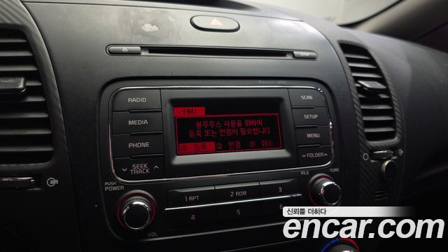 Kia K3 2013 — photo 20