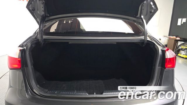 Kia K3 2013 — photo 26