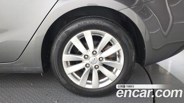 Kia K3 2013 — photo 7